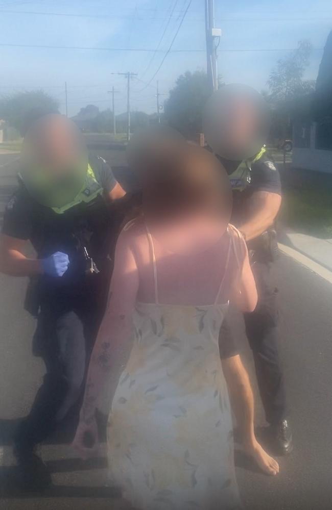 Police attempt to restrain one man as a woman approaches. Photos: Supplied.