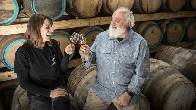 Bill Lark and distiller Silvia Segato toast the coming tax changes that will benefit the state’s distilleries. Picture: EDDIE SAFARIK