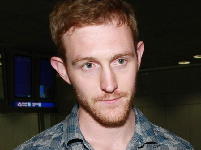 Frankfurt, Germany. Passengers on the first Australian charter flight out of Cairo arrive at Frankfurt airport. Pictured, Shane Alexander, 25, from Brisbane, professional Volleyball player. Pic - Britta Campion