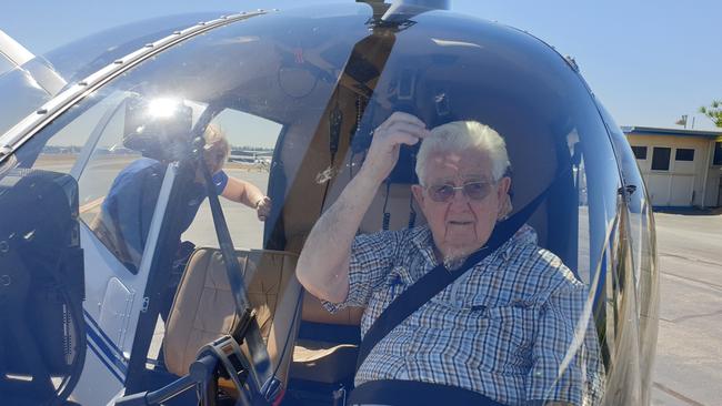 Colin Bell, 93, prepares for a ride in a helicopter.