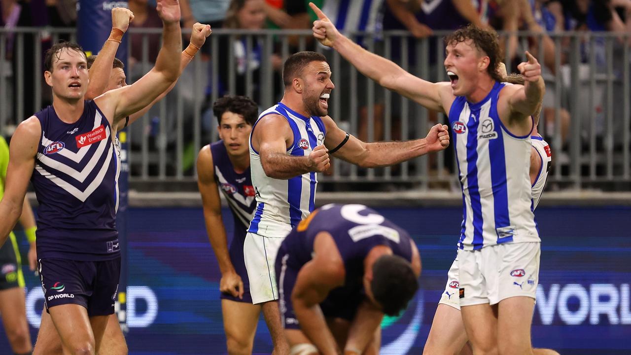 Griffin Logue and Nick Larkey celebrate the Kangaroos’ nailbiting win. Picture: Paul Kane/Getty Images