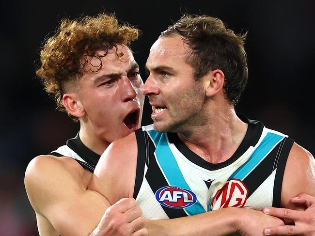 MELBOURNE, AUSTRALIA - JUNE 30: Jeremy Finlayson of the Power is congratulated by Logan Evans after kicking a goal during the round 16 AFL match between St Kilda Saints and Port Adelaide Power at Marvel Stadium, on June 30, 2024, in Melbourne, Australia. (Photo by Quinn Rooney/Getty Images)