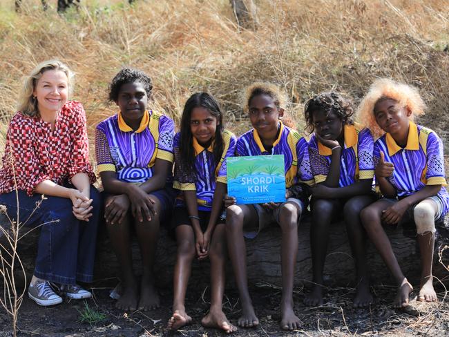 Indigenous Literacy Foundation ambassador Justine Clarke pictured with Barunga kids who wrote a song with the help of Clarke called Shordi Krik (Shorty Creek), which they will perform at the Sydney Opera House. Picture: supplied/Indigenous Literacy Foundation