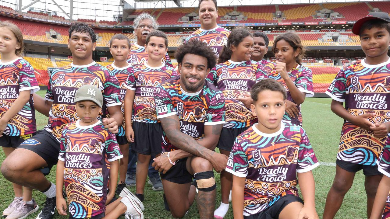 Selwyn Cobbo and Ezra Mam with a group of Deadly Choices kids on Monday 11th March 2024. Photo: Steve Pohlner