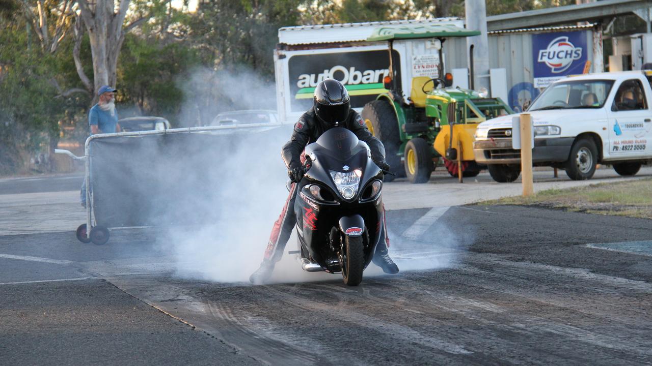 Regan Ward warms up the tyre on his Suzuki Hayabusa in the mod bike class at the final round of the CQDRA 2020 Championship at Benaraby raceway. Picture: Rodney Stevens