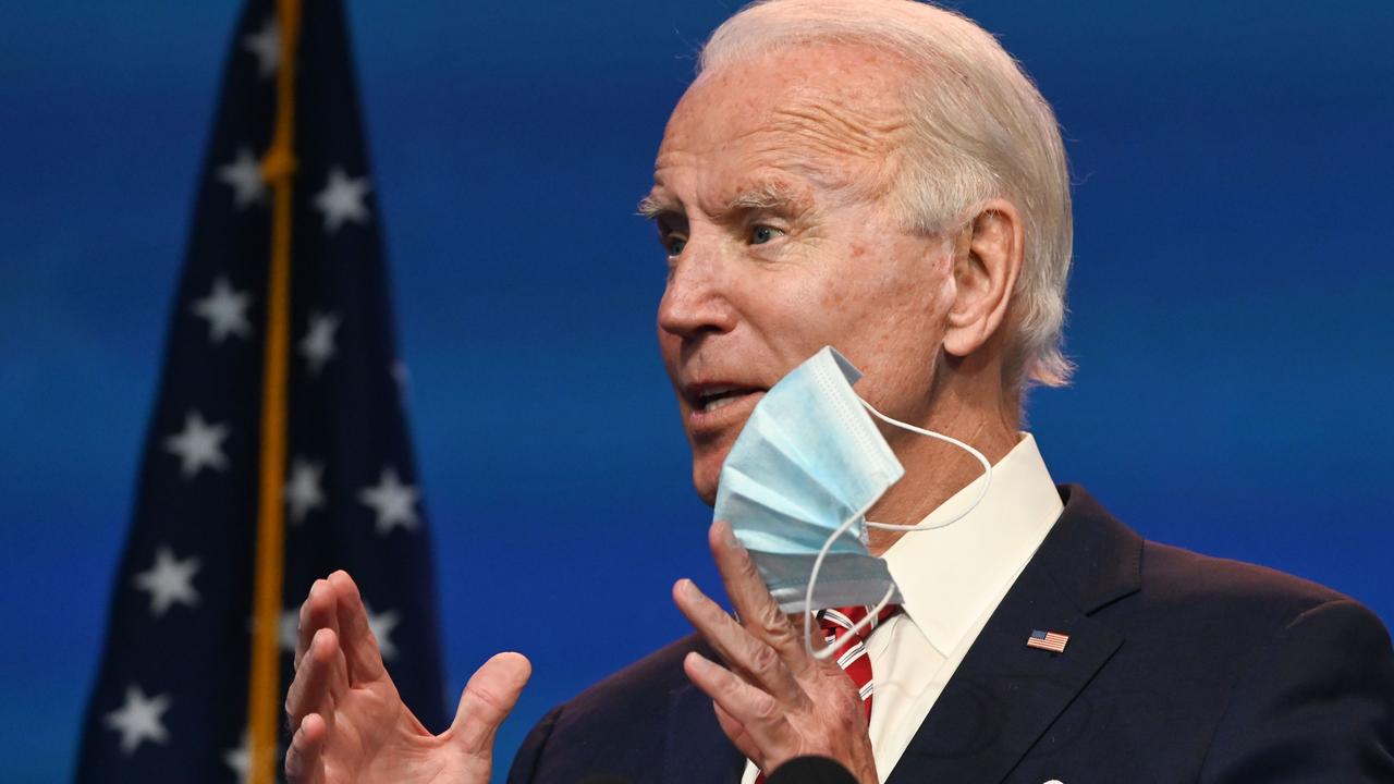 Joe Biden answers questions about COVID-19 at a press conference on Monday. Picture: Roberto Schmidt/AFP