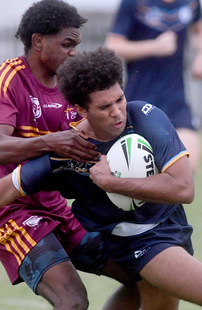 Round 4 of the Townsville Blackhawks Schoolboy Trophy. Ryan Catholic College against Southern Cross Catholic College at Ryan Catholic College. Taj Croft is tackled. Picture: Evan Morgan