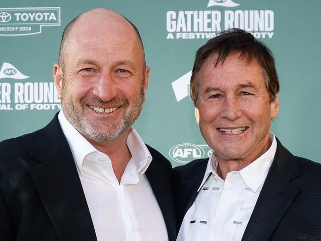 ADELAIDE, AUSTRALIA - APRIL 03: Jeff Browne and Craig Kelly pose for a photo before the 2024 AFL Gather Round Welcome Dinner Event at Glenelg Foreshore on April 03, 2024 in Adelaide, Australia. (Photo by Dylan Burns/AFL Photos via Getty Images)