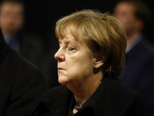 German Chancellor Angela Merkel arrives to sign the condolence book at the Memorial Church in Berlin. Picture: Hannibal Hanschke/Pool Photo via AP