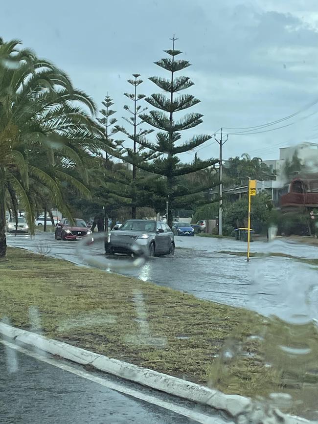 Water levels rising on Military Rd. Picture: Supplied