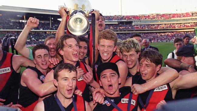 Mark Thompson (right) with his 1993 premiership teammates.