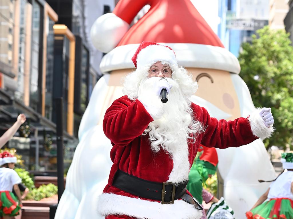 Santa performing in the Queen St Mall on Thursday. Picture: John Gass