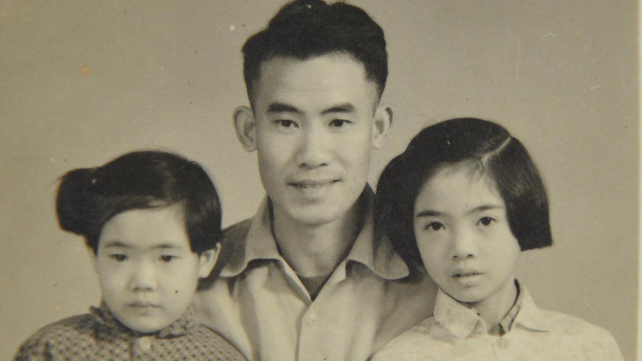 Dr Yu (right) with her father Keng Qiang and her sister after her mother’s death during the Cultural Revolution.