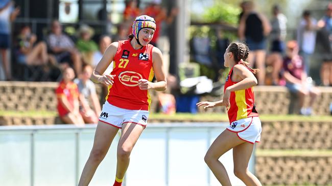 Dekota Baron of the Suns celebrates kicking a goal. (Photo by Albert Perez/AFL Photos via Getty Images)