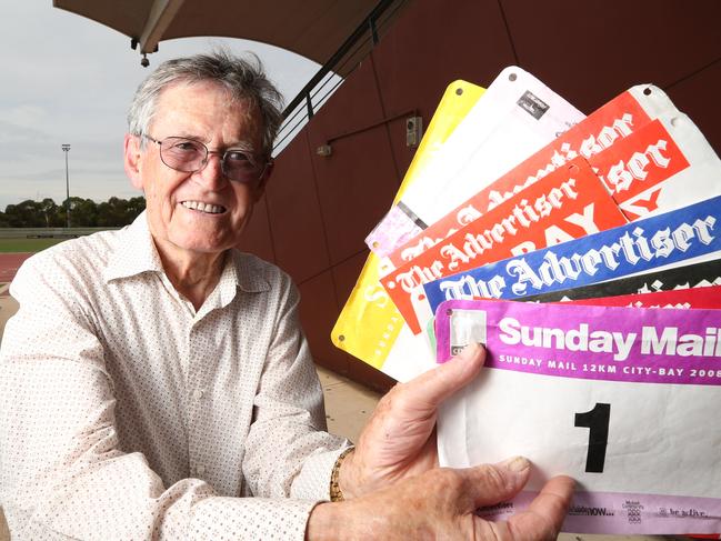 21.1.2016.Robert "Bob" Clarke, 91, is being awarded a Member (AM) of the Order of Australia for his significant service to athletics in South Australia, particularly through the City-Bay Fun Run, and to the community. Bob at SA Athletics Stadium on the track with his City-Bay #1 plate. The #1 was retired when he bowed out of the organisation after 12 years.  pic tait schmaal.