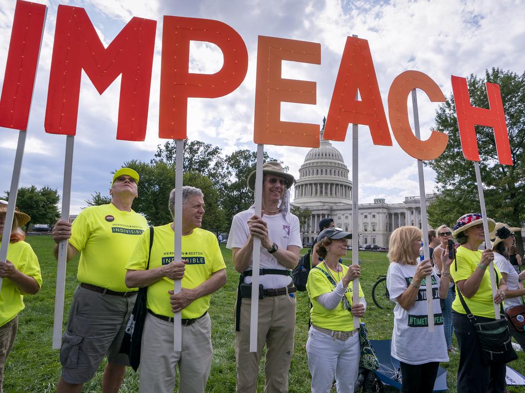 Activists rally for the impeachment of President Donald Trump, at the Capitol in Washington. Picture: AP