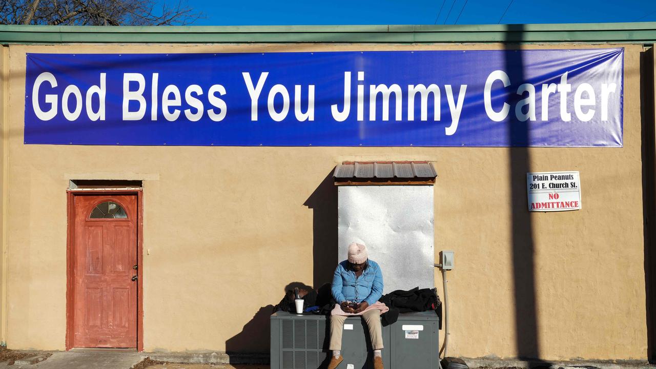 A sign adorns a building on the funeral procession route for former President Jimmy Carter on January 9, 2025 in Plains, Georgia. Picture: Getty Images via AFP