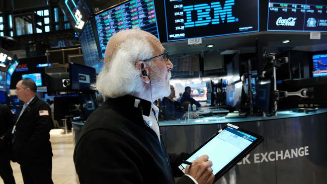 Traders on the floor of the New York Stock Exchange react to Jerome Powell’s Jackson Hole speech. Picture: AFP