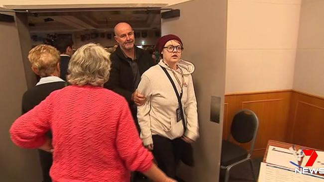 Activist Amber Holt is led away after the Morrison incident. Picture: Seven News