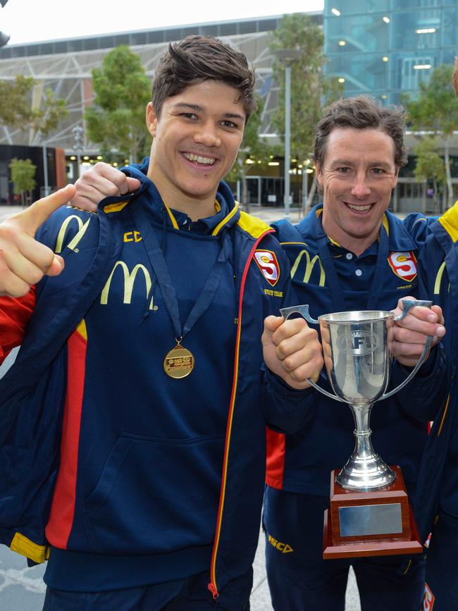 Lewis with SA under-18s coach Tony Bamford after winning the 2018 national championships. Picture: AAP/Brenton Edwards