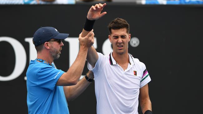 Thanasi Kokkinakis was forced to retire due to injury. (AAP Image/Lukas Coch) 