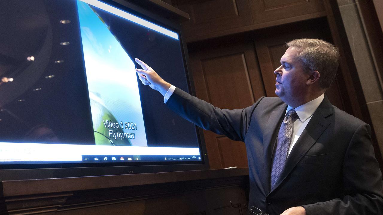 Naval Intelligence deputy director Scott Bray explains a video of an unidentified aerial phenomena (UAP) during a rare public hearing by the US Congress into UFOs and the possibility of alien life. Picture: Getty Images/AFP