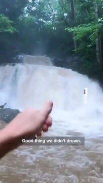 Tourists flee as waterfall becomes a flash flood