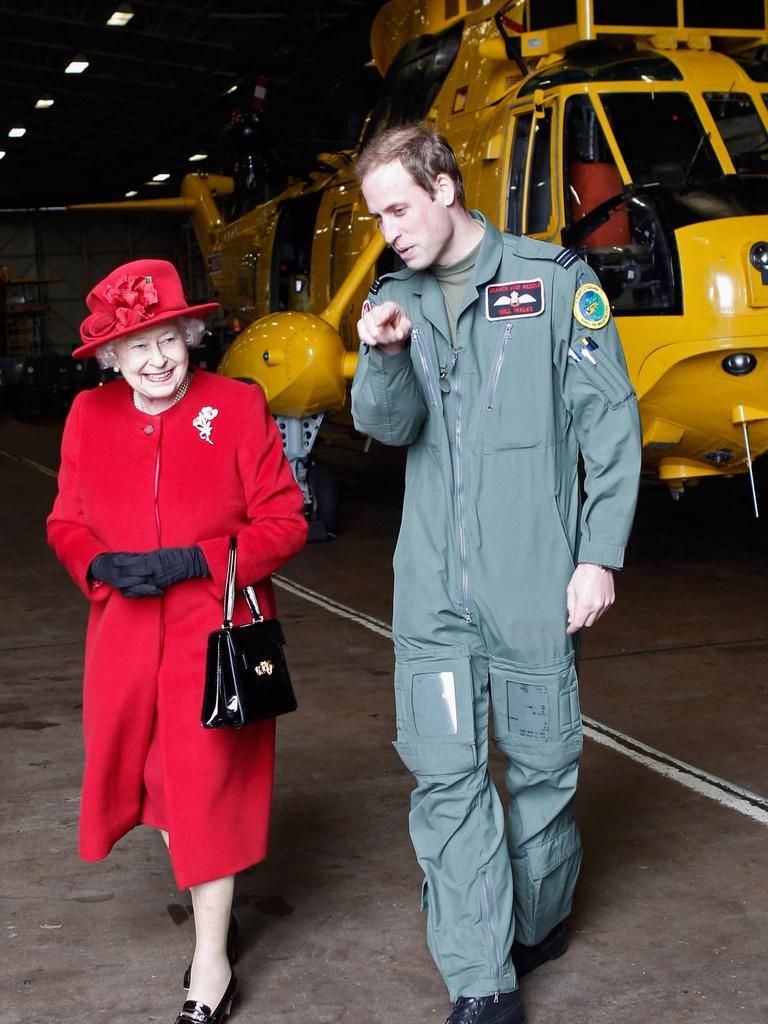 The Queen with William at RAF Valley in 2011. Picture: Christopher Furlong/AFP