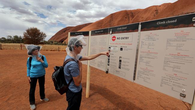 A group of Japanese tourists missed out on climbing Uluru yesterday after it was closed due to the temperature reaching 40 degrees. Picture: David Geraghty/The Australian