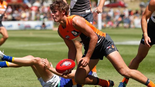 Harry Perryman fires off a handball in the NEAFL. Picture: Getty Images