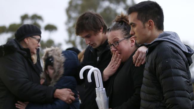 Family members gather in Royal Park. Picture: Getty Images