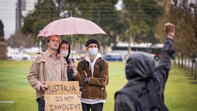 The Black Lives Matter protest in Adelaide in the rain on Saturday. Picture: Mike Burton