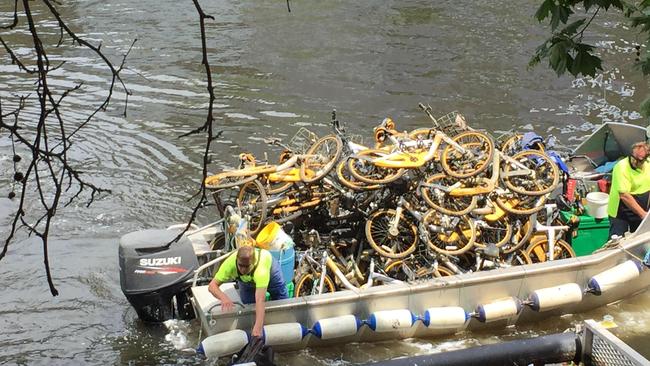 oBikes piled up after being fished out of the Yarra River. Picture: Damon Johnston