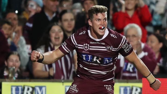 Manly's Reuben Garrick celebrates after scoring his third try during the Manly v Parramatta NRL match at Lottoland, Brookvale. Picture: Brett Costello