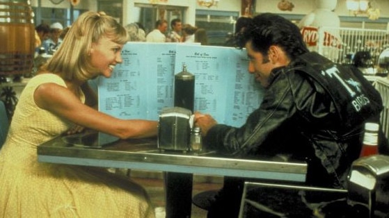 John Travolta with Olivia Newton John in Grease.