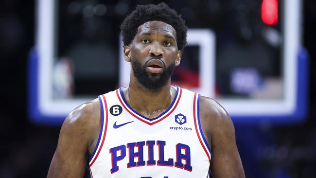 PHILADELPHIA, PENNSYLVANIA - OCTOBER 12: Joel Embiid #21 of the Philadelphia 76ers looks on during the first quarter against the Charlotte Hornets at Wells Fargo Center on October 12, 2022 in Philadelphia, Pennsylvania. NOTE TO USER: User expressly acknowledges and agrees that, by downloading and or using this photograph, User is consenting to the terms and conditions of the Getty Images License Agreement. (Photo by Tim Nwachukwu/Getty Images)