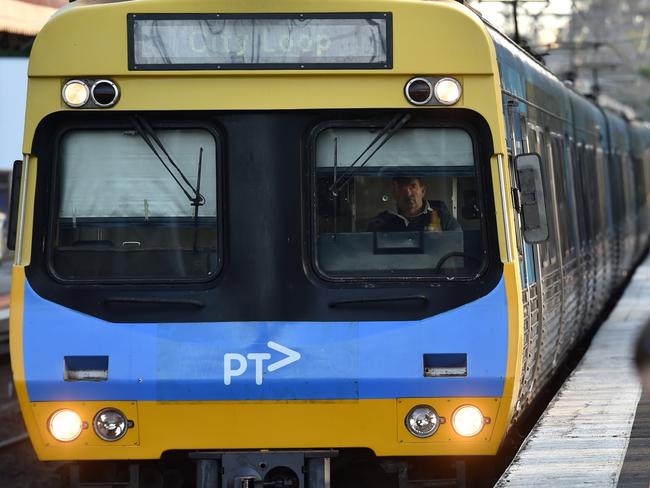 Peak hour commuters wait for a city loop train at Newmarket Station ahead of a train strike in Melbourne, Friday, Sept. 4, 2015. Close to 700 train services will be cancelled across Melbourne on Friday as part of the Rail, Train and Bus Union's rolling industrial action against Metro Trains. (AAP Image/Tracey Nearmy) NO ARCHIVING