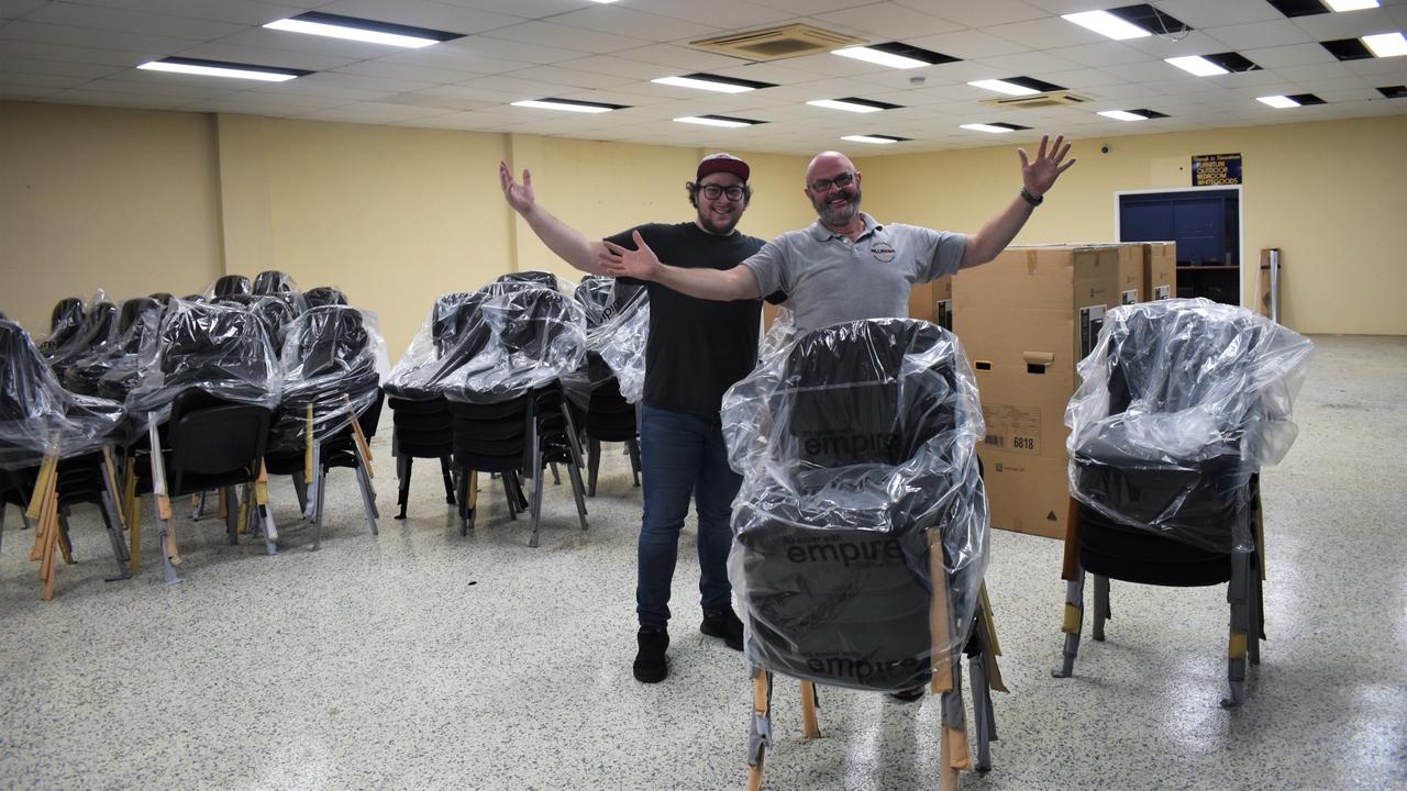 Rob and Dylan Williams at the renovation site of what will be the new Millennium Collectables on East Street.