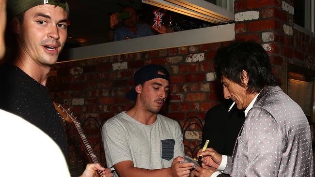 Rolling Stones member Ronnie Woods arriving at The Fish House in Burleigh. Photo: David Clark