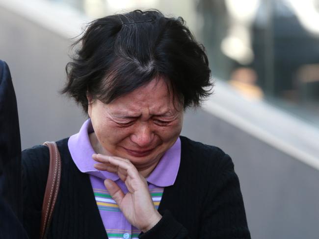 Julie Zhu, parents of Connie, leaving Glebe Coroners Court after the inquest