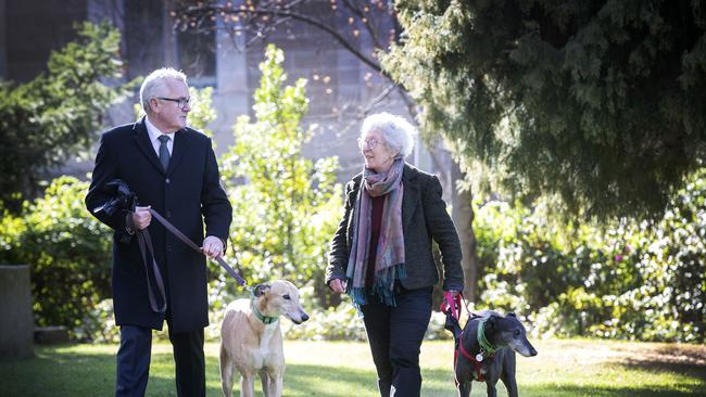 Andrew Wilkie MP and Let Greyhounds Run Free co ordinator Fran Chambers with Patrick Perfect and Jennifer Jane at Hobart. Picture Chris Kidd