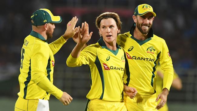 Australian T20 spinner Adam Zampa celebrates a wicket with Glenn Maxwell and Aaron Finch.