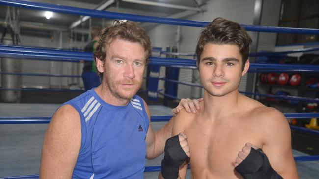 Warwick Boxing Club head trainer Damien Lawler and national champion Jake Wyllie.