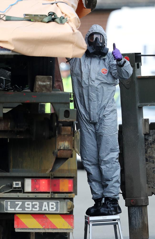 Forensic teams remove a recovery truck used in the aftermath of the Salisbury nerve agent attack in Gillingham, England. Picture: Getty