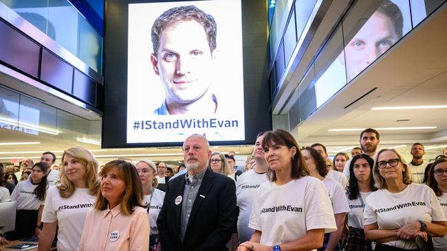 Ella Milman and Mikhail Gershkovich, the parents of Evan Gershkovich, stood with Wall Street Journal staff in the newspaper’s New York newsroom in August 2023. Picture: Cam Pollack/The Wall Street Journal