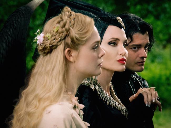 Elle Fanning, Angelina Jolie and Sam Riley in Maleficent: Mistress Of Evil.