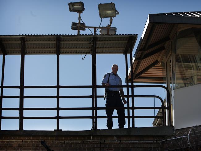 A tower guard keeps watch inside the Long Bay Correctional Complex in Malabar.