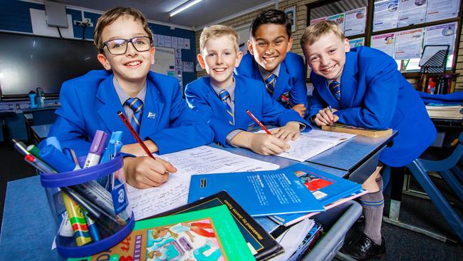 Marist College Ashgrove Year 5 students Patrick Hambleton, Connor Brown, Gabriel Mathews and Flynn Barrett endorsed the changes made to NAPLAN. Photo: Nigel Hallett.