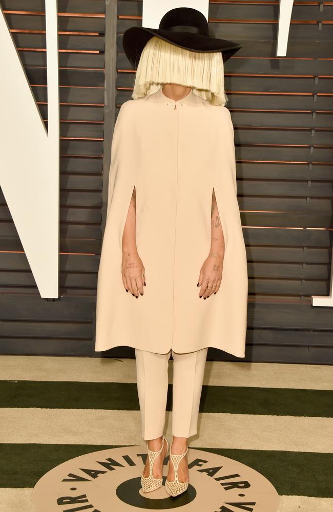 Face it ... Sia at Vanity Fair’s Oscars party. Picture: Pascal Le Segretain