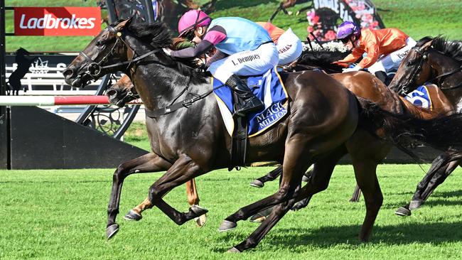 Luke Dempsey storms home aboard Give Me Space to win the Group 3 Vo Rogue Plate at Eagle Farm. Picture: Grant Peters / Trackside Photography